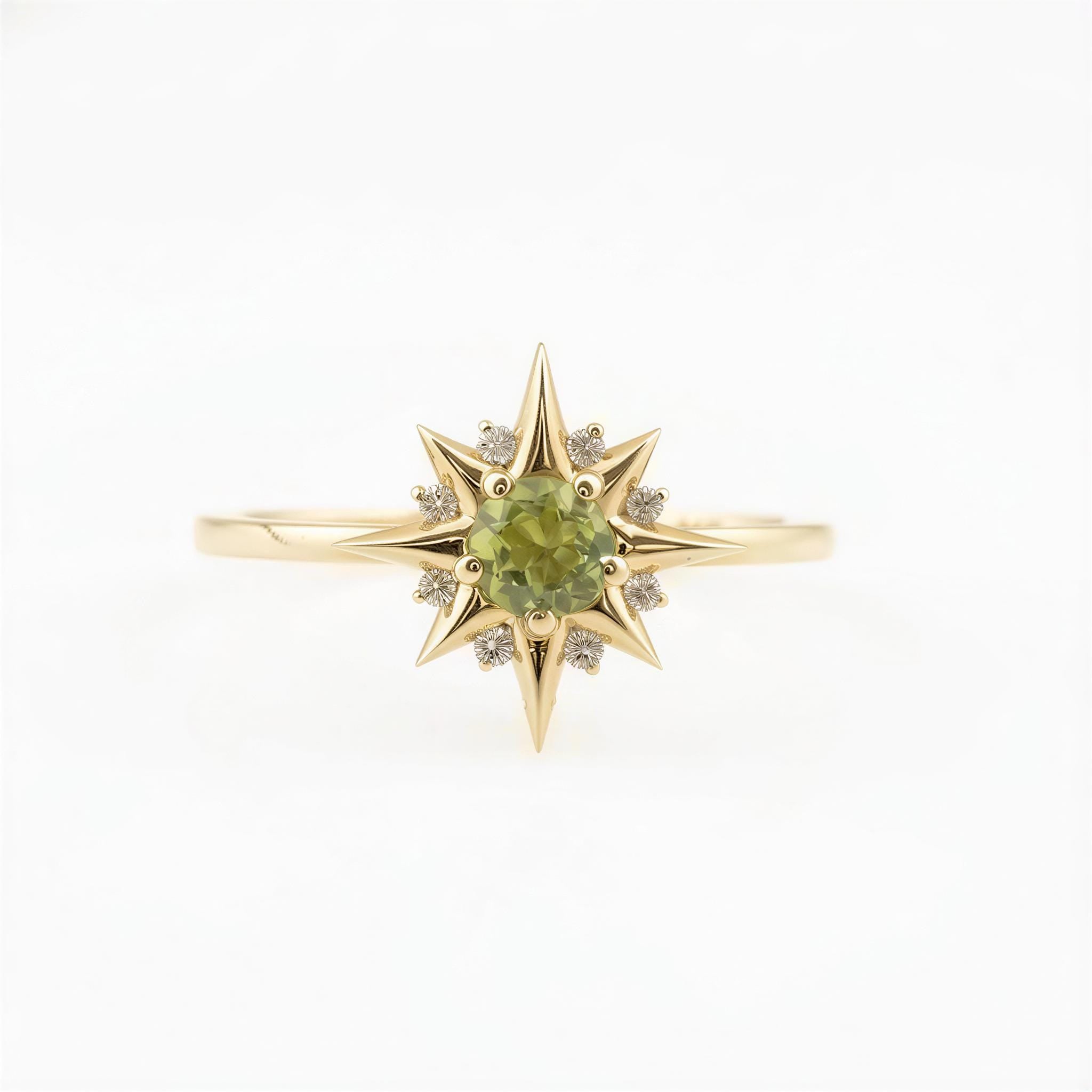 A gold ring with a large green gemstone in the center, surrounded by smaller diamonds.