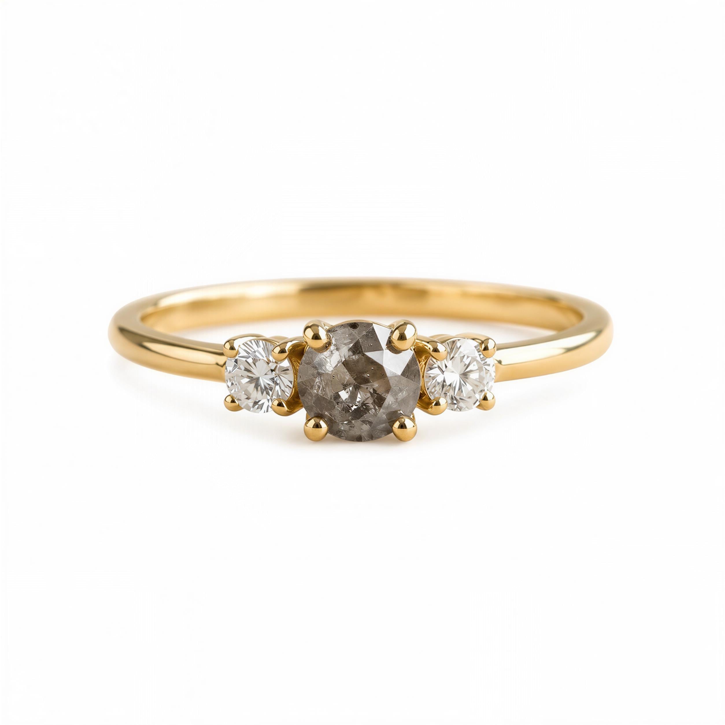 A gold ring with a large oval-shaped diamond in the center, surrounded by smaller diamonds.