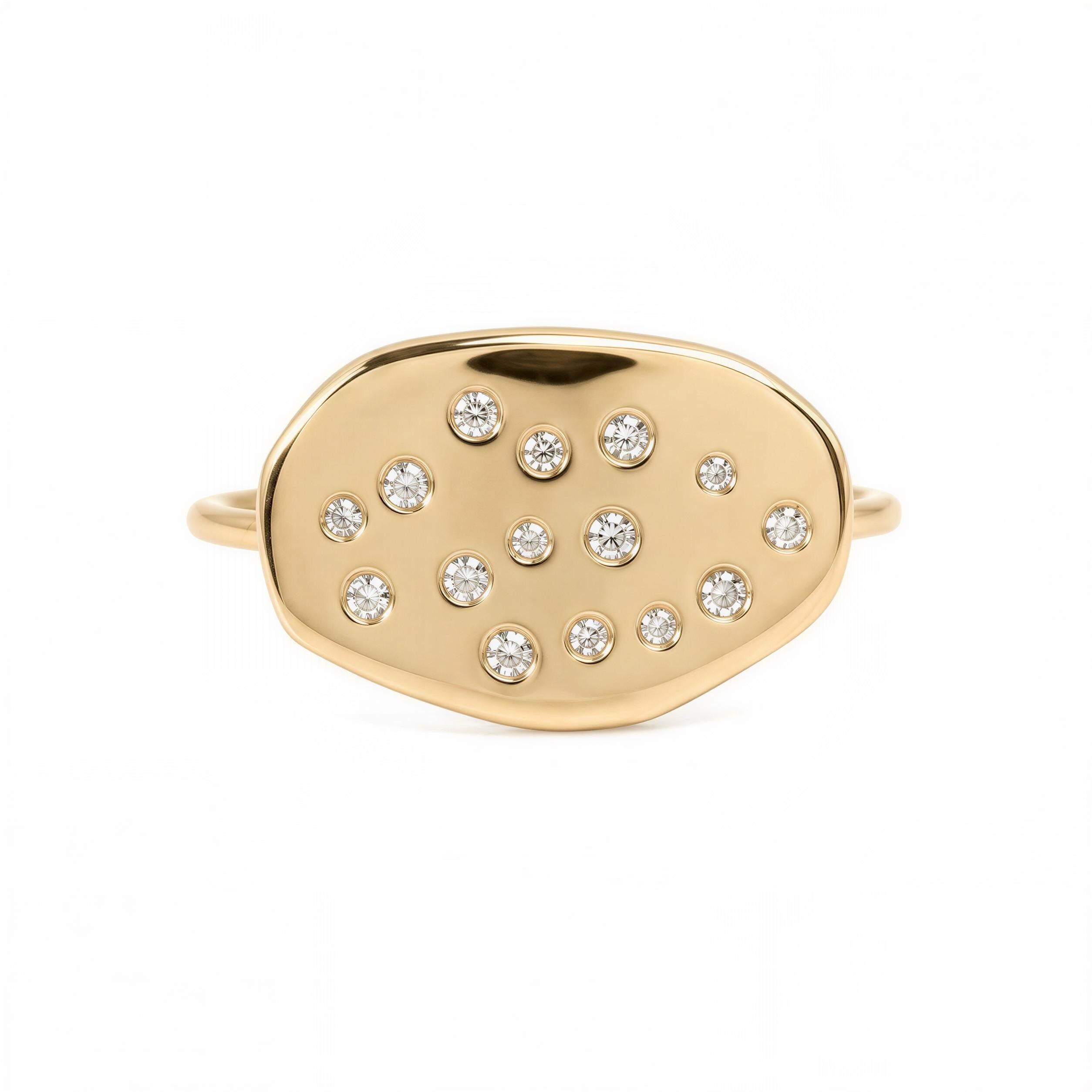 A gold ring with a large oval-shaped stone in the center, surrounded by smaller stones.
