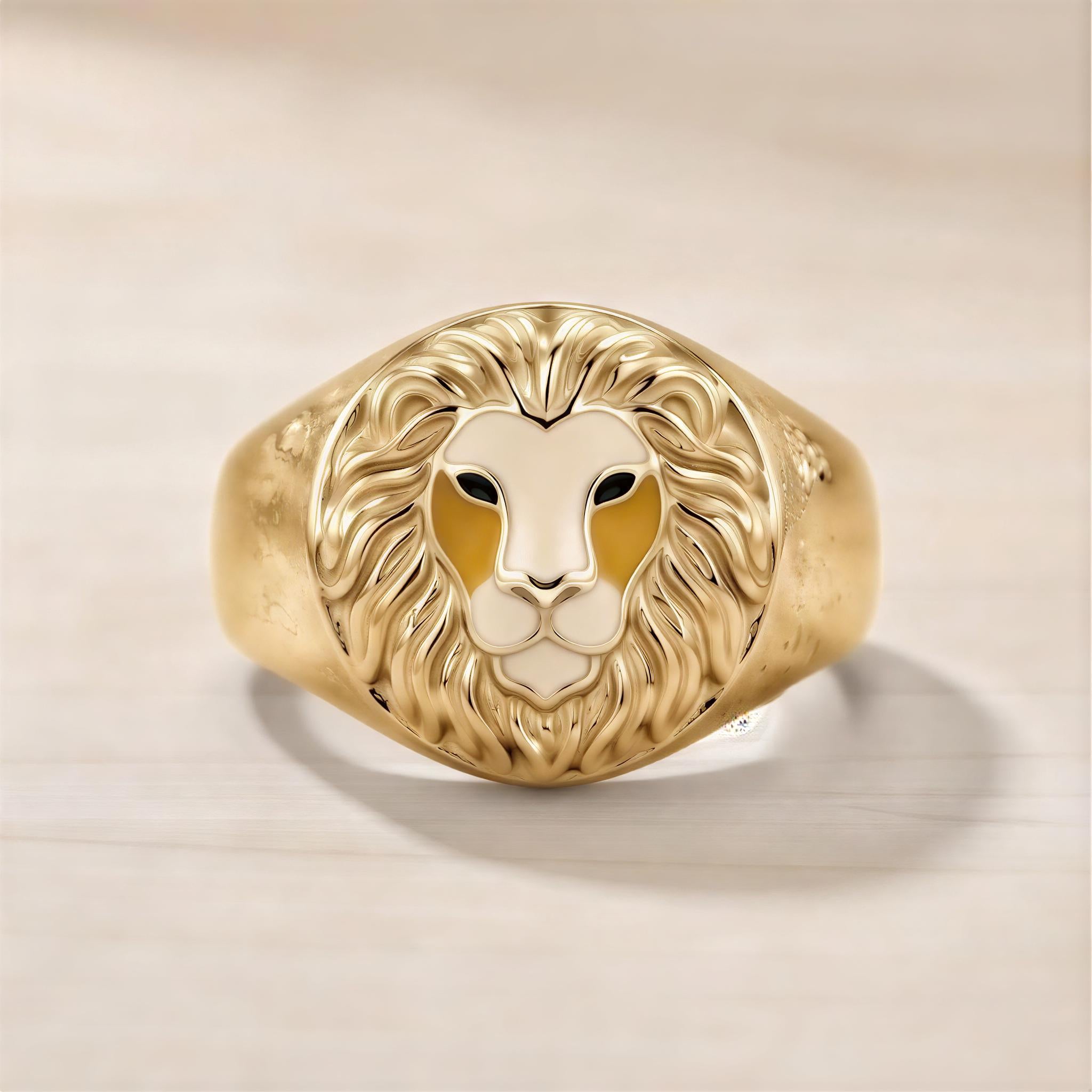 A gold ring with a detailed lion's head design on the front.