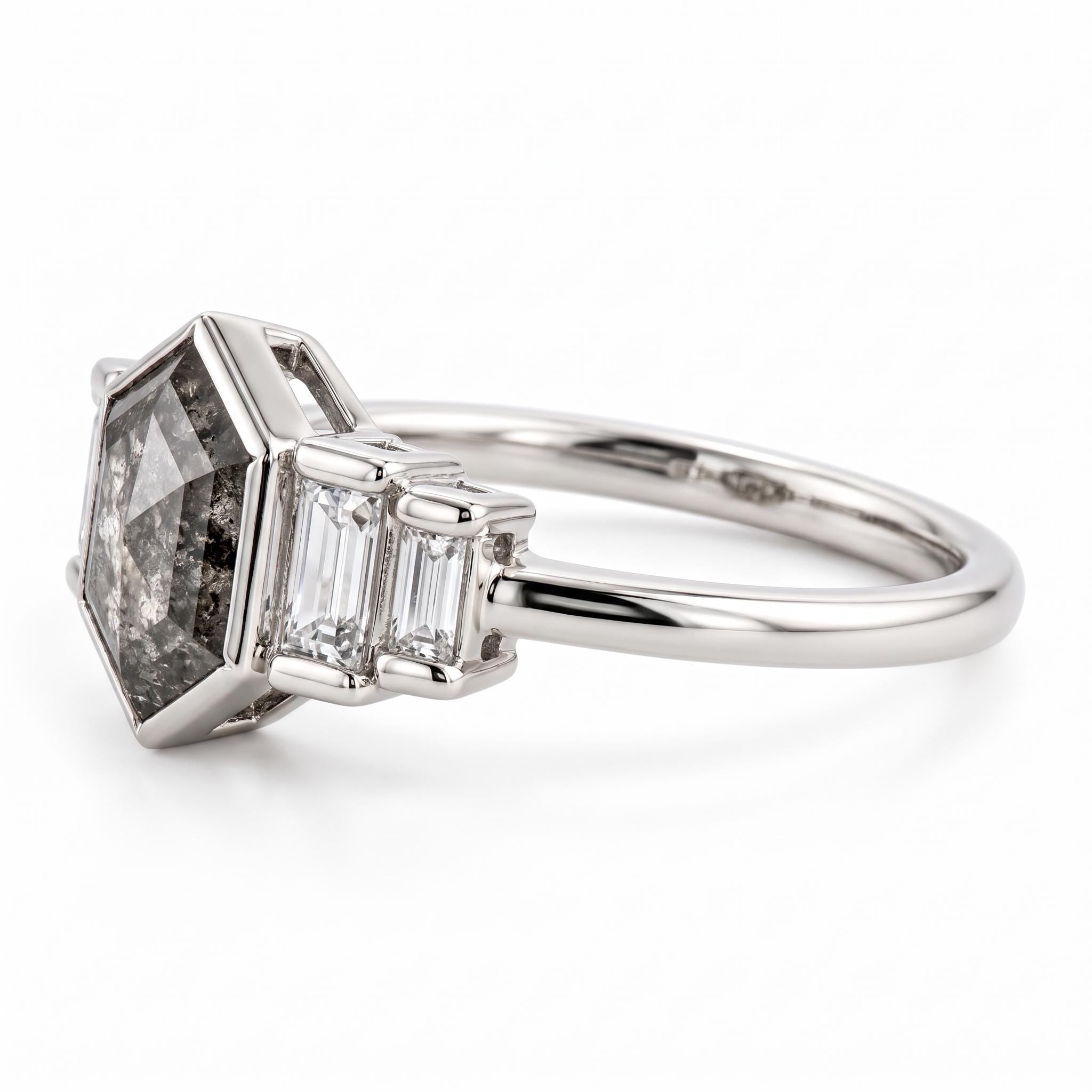 Close-up of hexagon salt and pepper diamond and baguette side diamonds