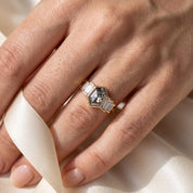 Side view of 14K yellow gold five stone diamond ring