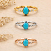 Three turquoise and diamond ring variants in yellow, rose and white gold