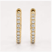 Natural diamond huggie hoop earrings, yellow angle view