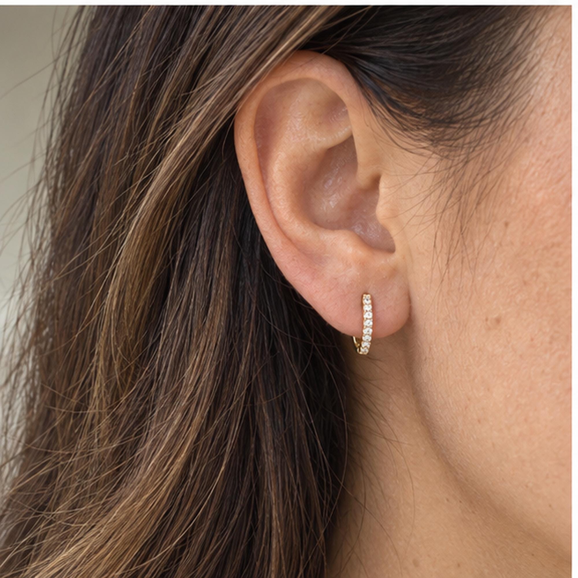 Natural diamond huggie hoop earrings, yellow detail view