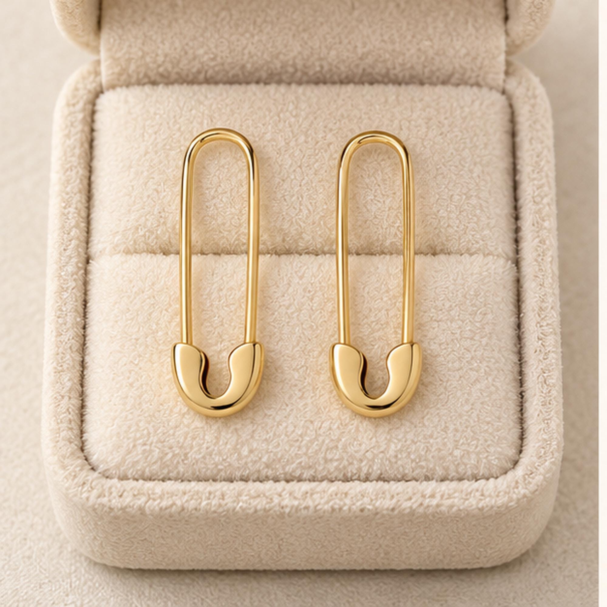 Solid gold safety pin earrings, box view