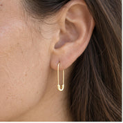 Solid gold safety pin earrings, single earring view