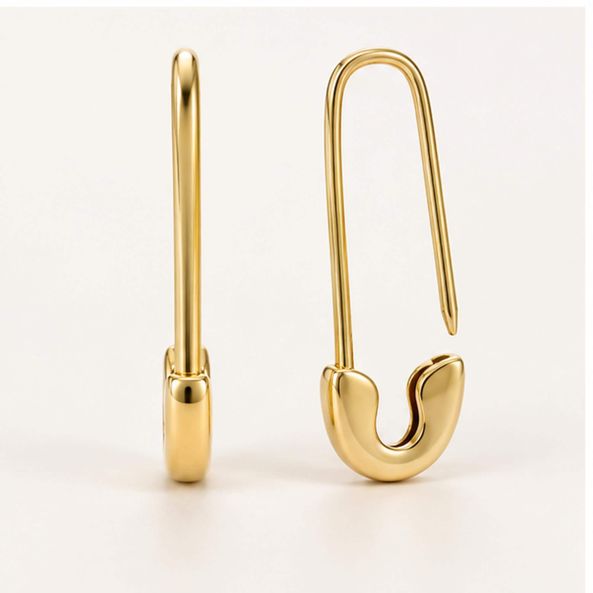Solid gold safety pin earrings, yellow detail view