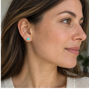 Arizona turquoise diamond halo earrings, model ear 1 view